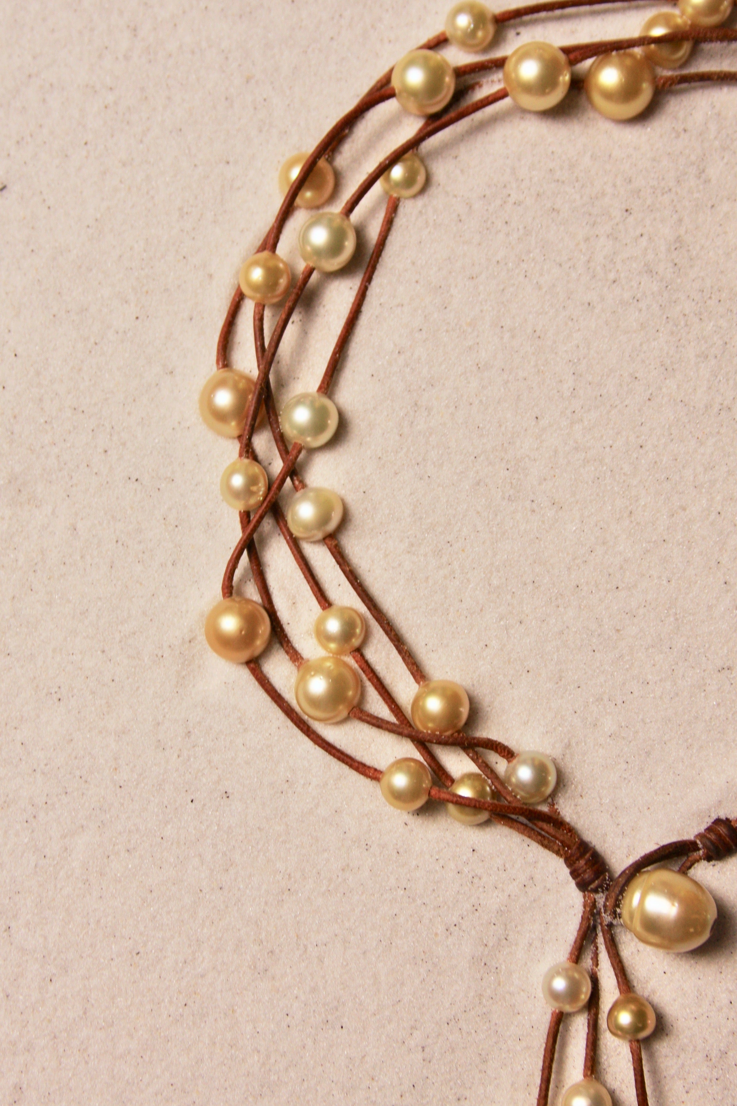 Music Necklace Four Strand Gold