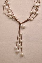 Music Necklace Four Strand White