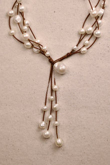 Music Necklace Four Strand White