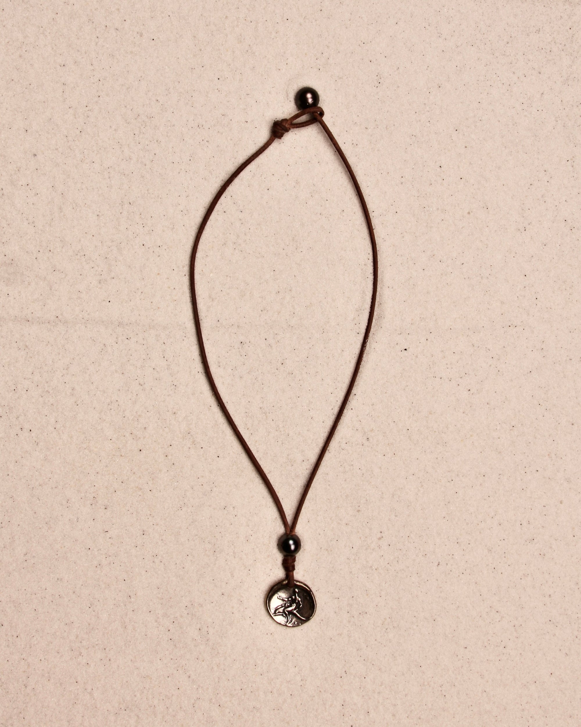 Boy On Dolphin Coin Necklace
