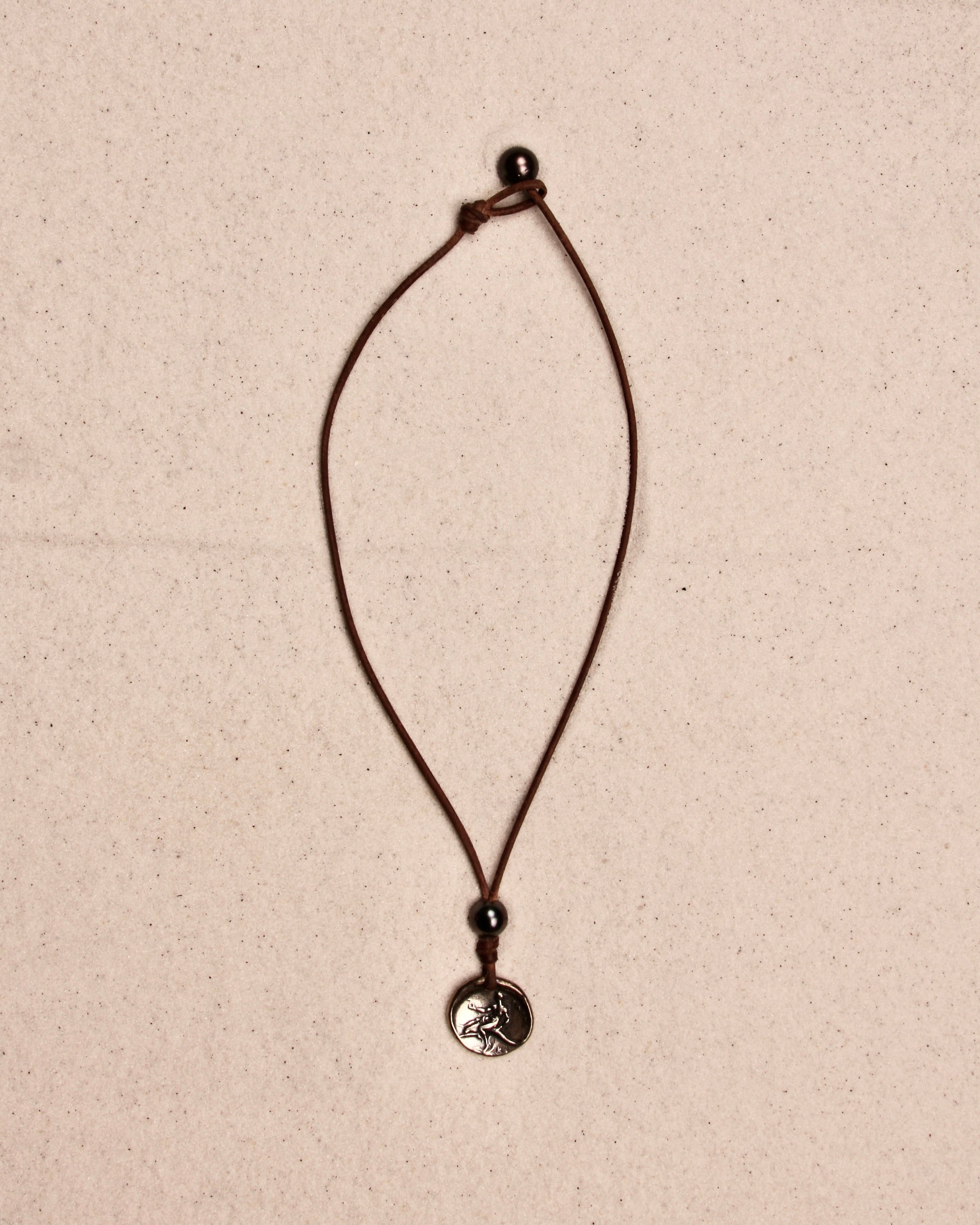 Boy On Dolphin Coin Necklace