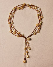 Music Necklace Four Strand Gold