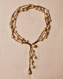 Music Necklace Four Strand Gold