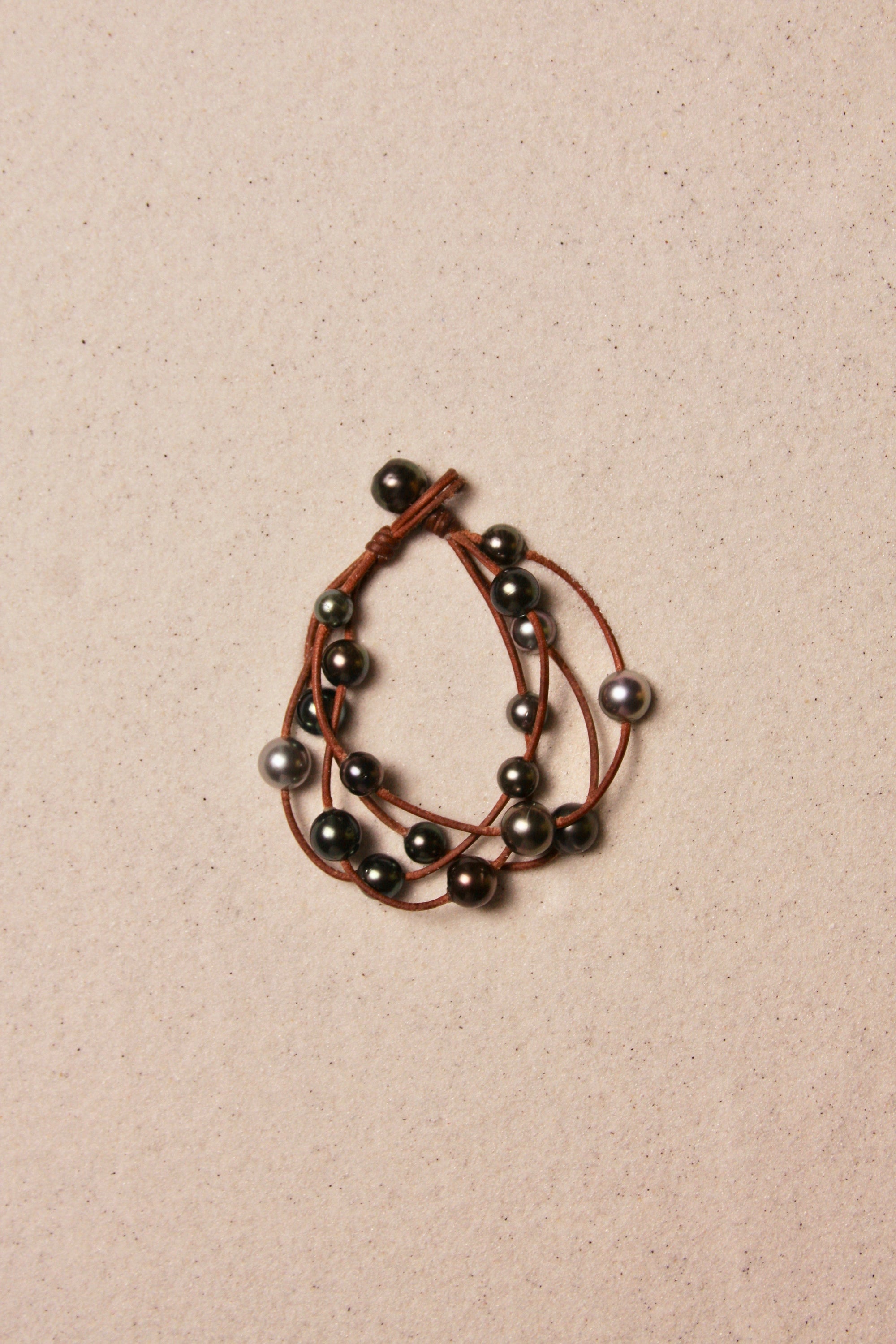 Music Bracelet Four Strand Black