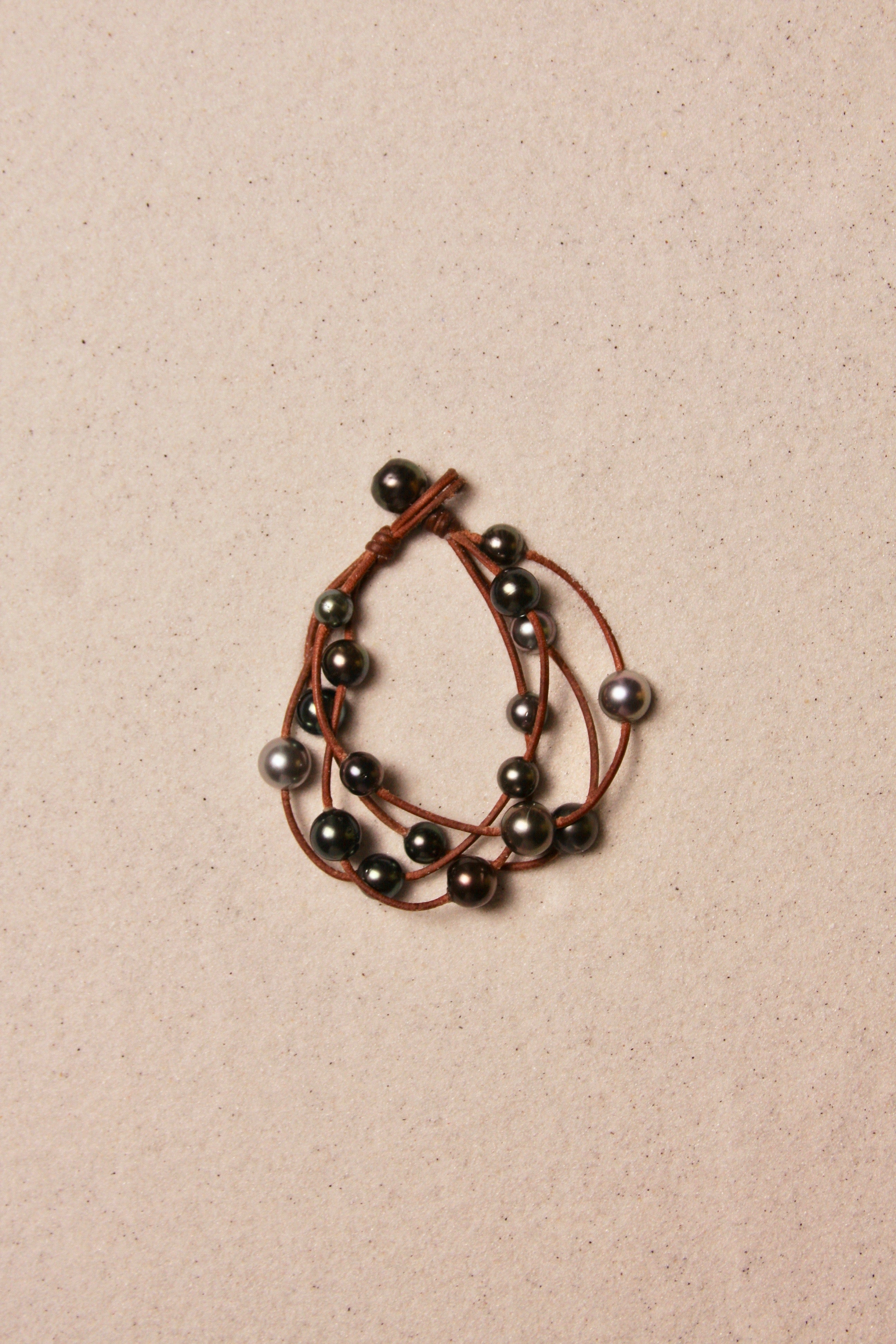 Music Bracelet Four Strand Black