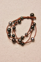 Music Bracelet Four Strand Black
