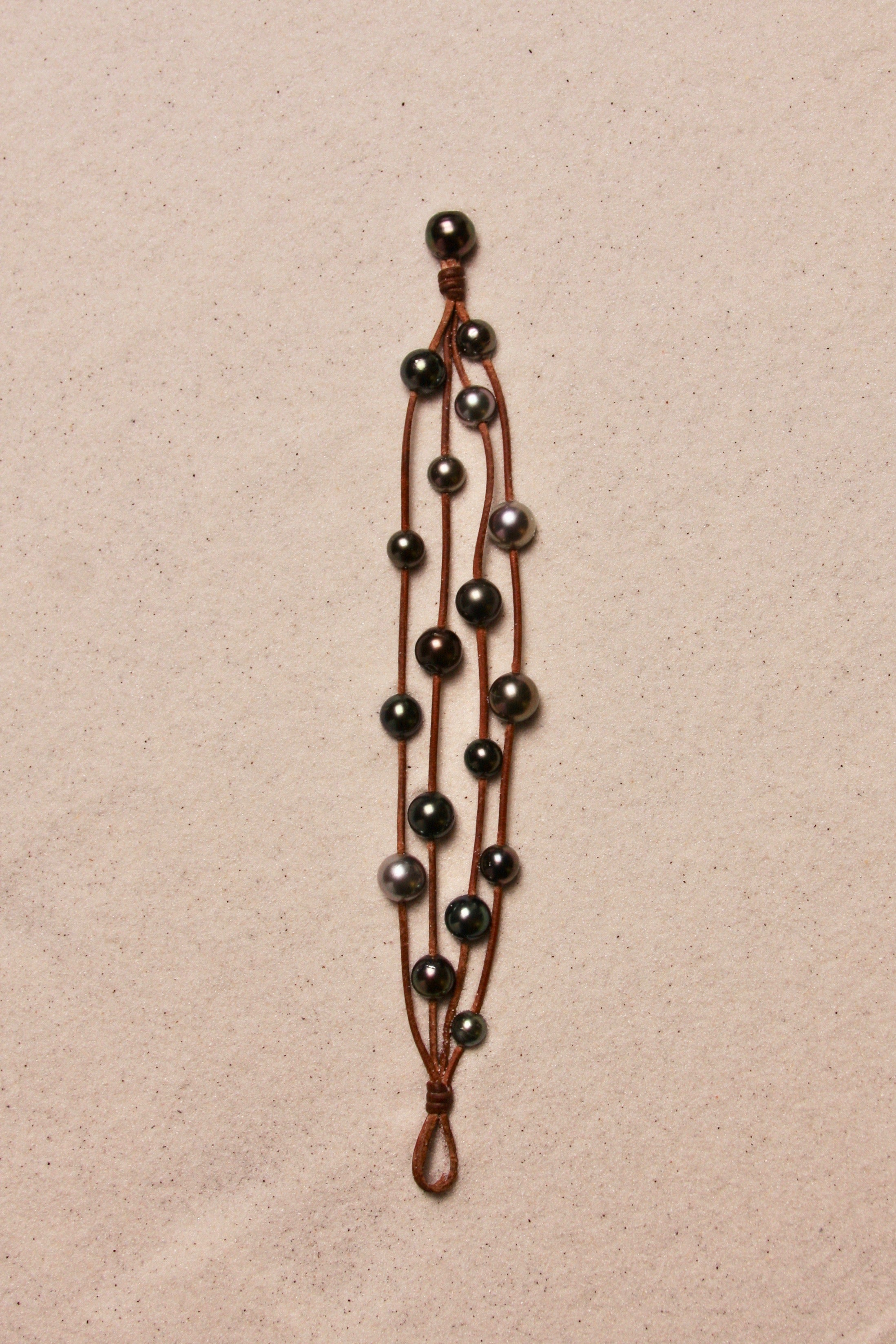 Music Bracelet Four Strand Black