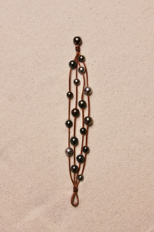 Music Bracelet Four Strand Black
