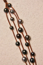 Music Bracelet Four Strand Black