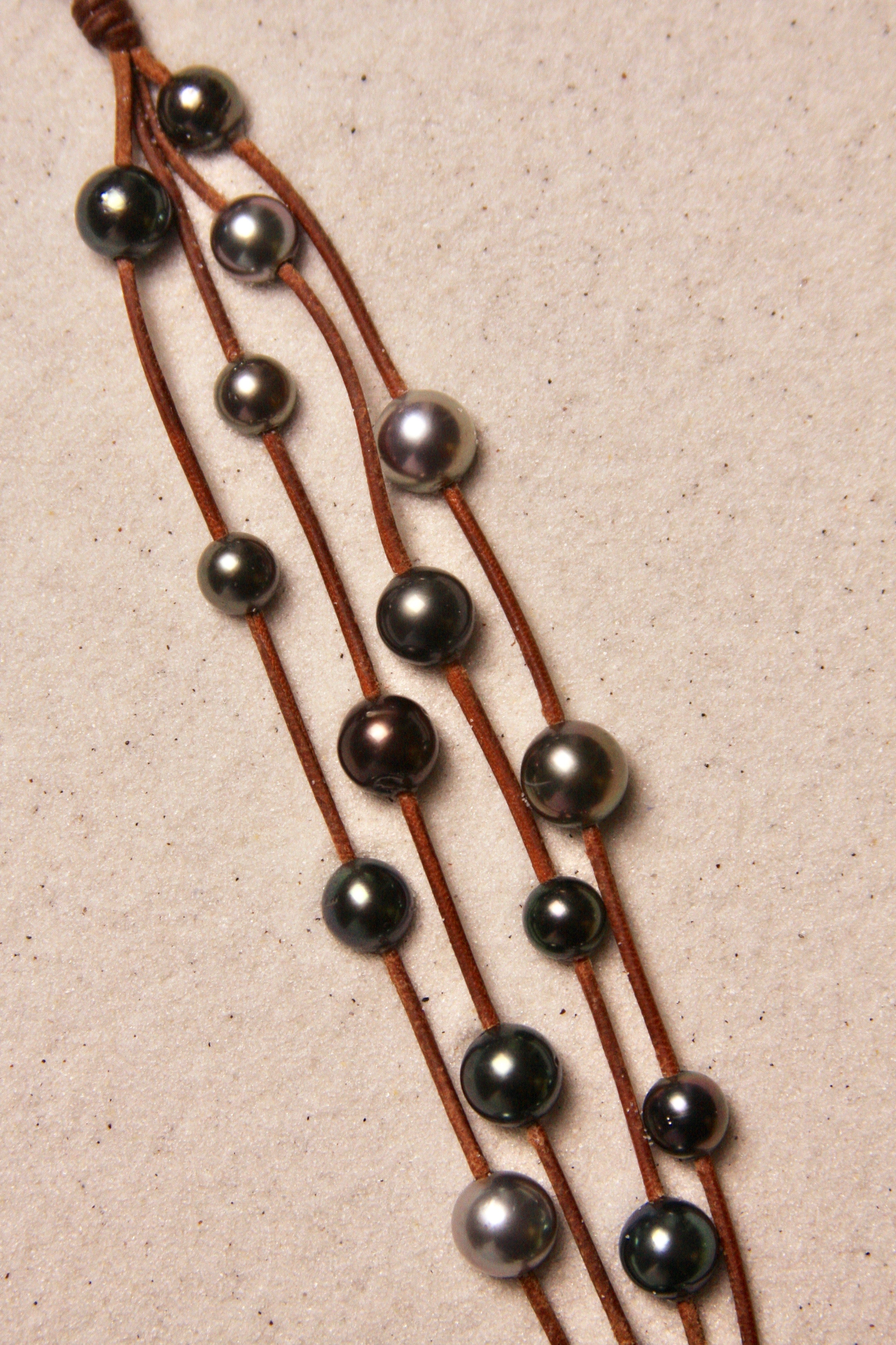 Music Bracelet Four Strand Black