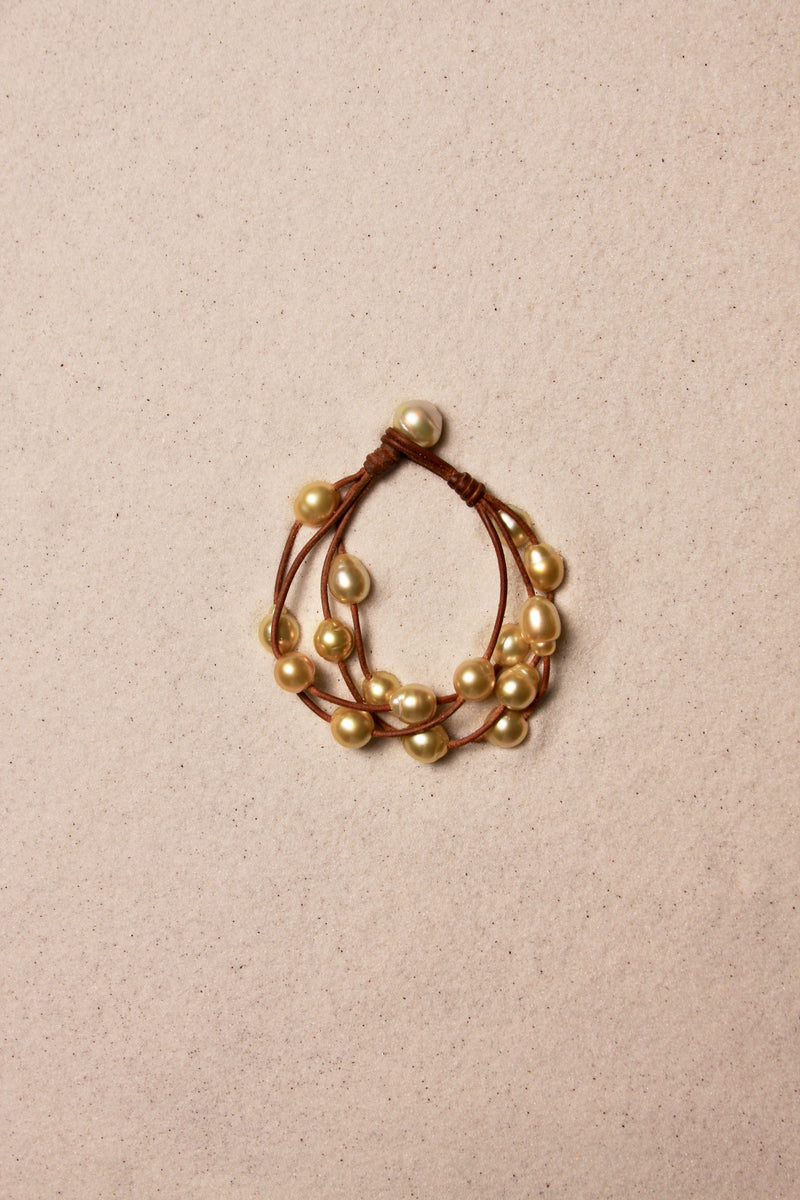 Music Bracelet Four Strand Gold