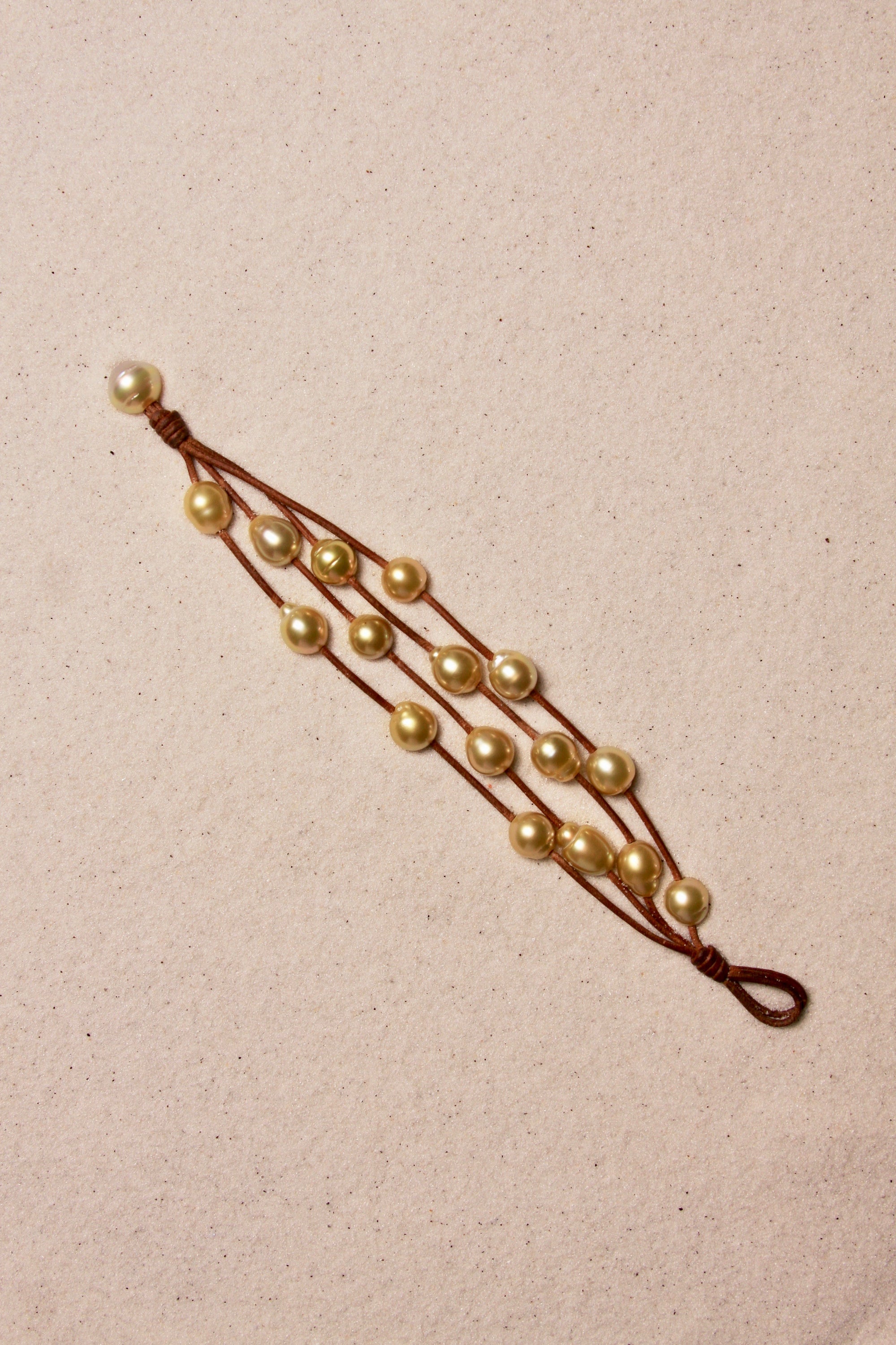Music Bracelet Four Strand Gold