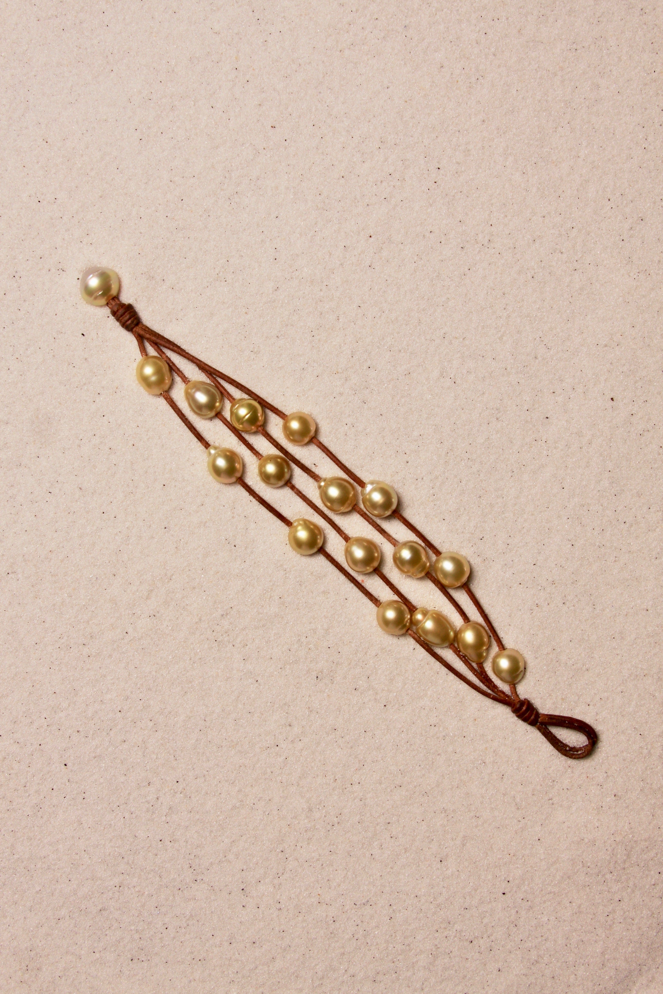 Music Bracelet Four Strand Gold